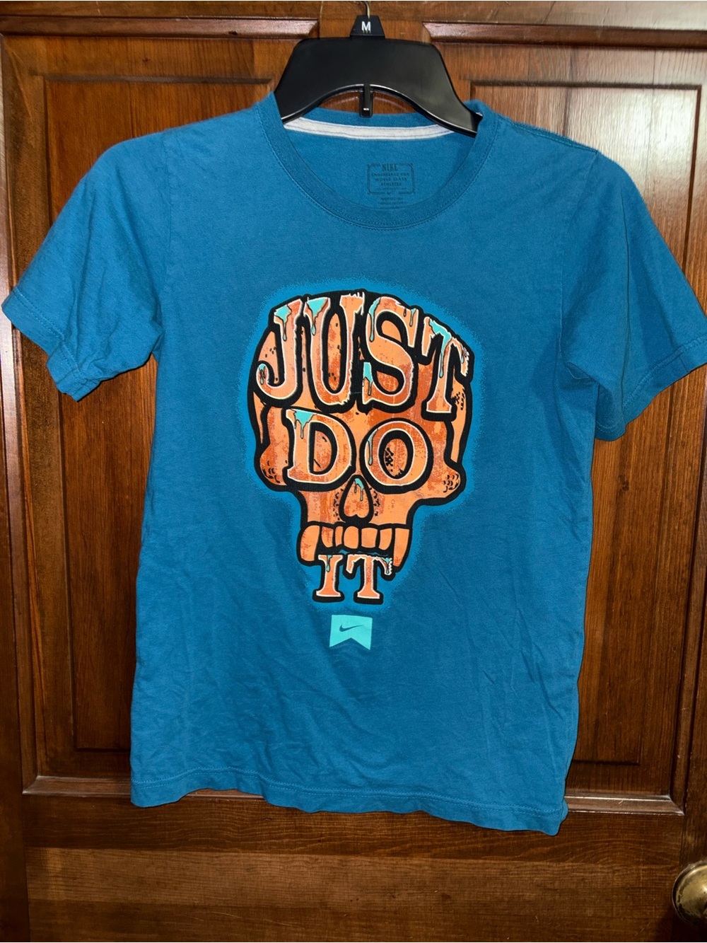 Nike Teal Blue Tee with Orange Skull 'Just Do It' Graphic